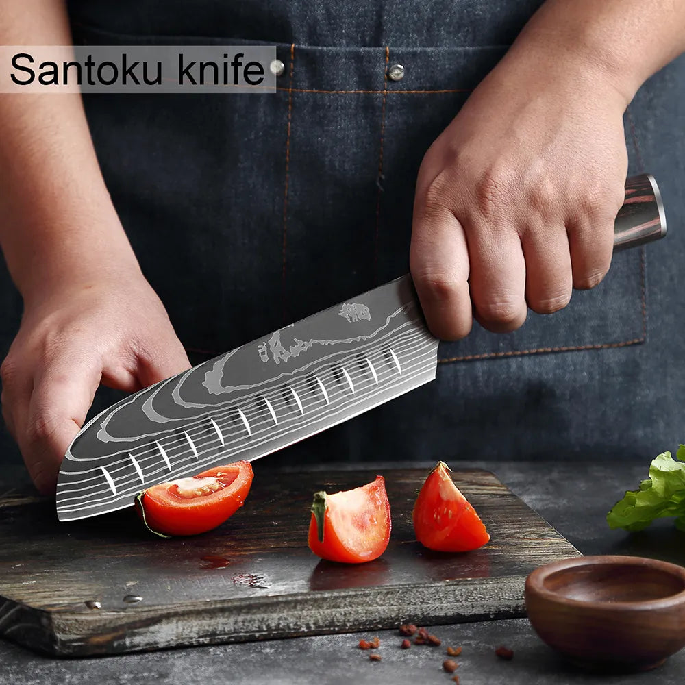 Santoku kitchen knife cutting tomato